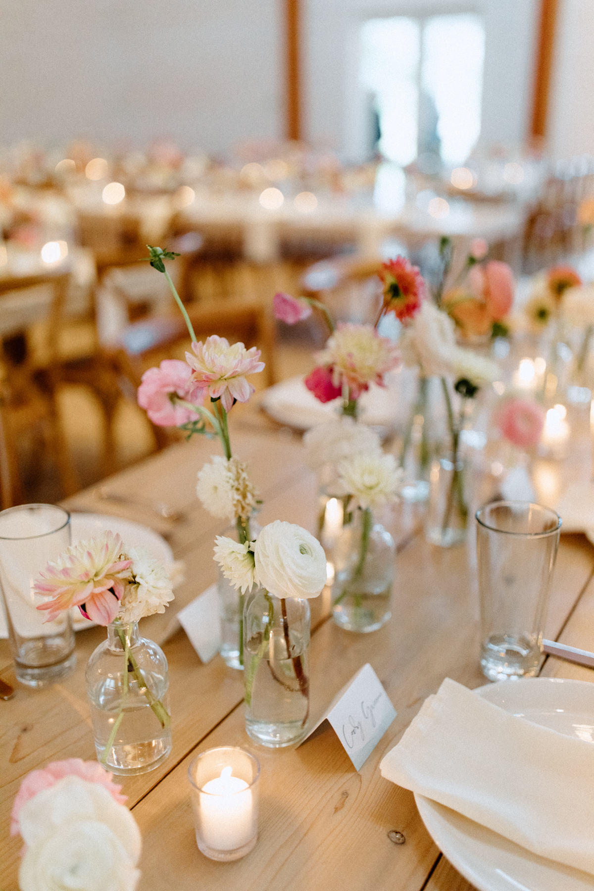 wedding table flowers bud vases on farmhouse tables