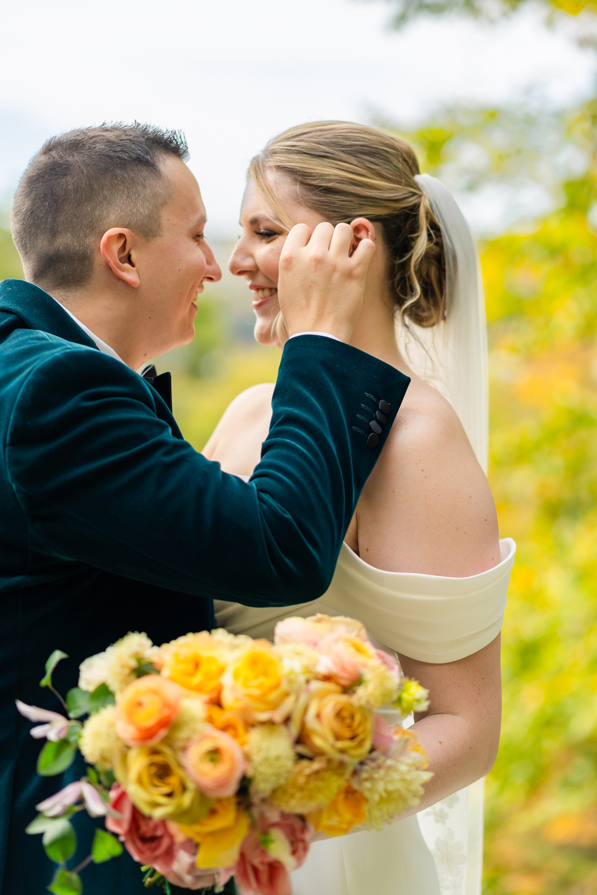 Lake view Fall wedding by a Burlington Vermont wedding florist golden mustard yellow and pink wedding flowers for a lakeside wedding in southern Vermont wedding venue Lake Bomoseen Lodge Castelton Vermont bride and groom first look