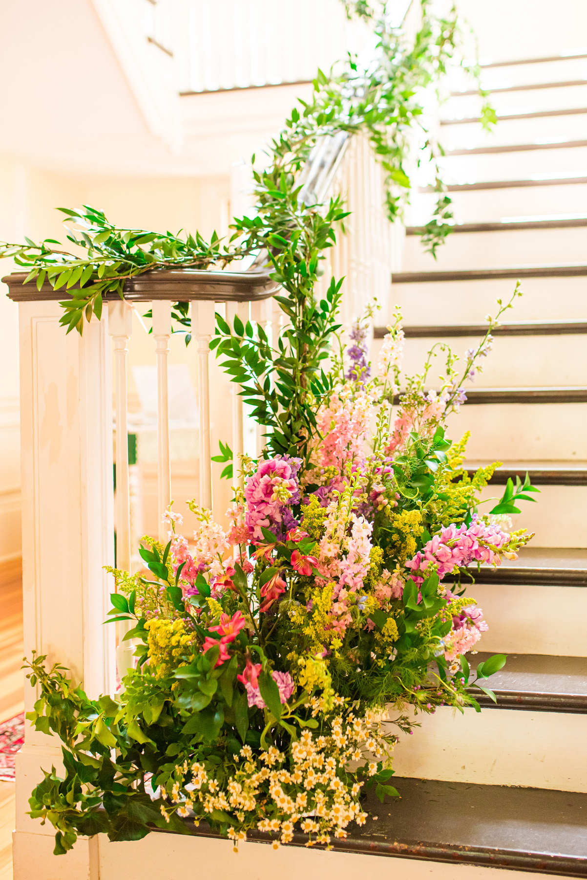 Romantic Vermont wedding flowers stair floral installations at John Hay Estate at The Fells on Lake Sunapee, NH wedding venue