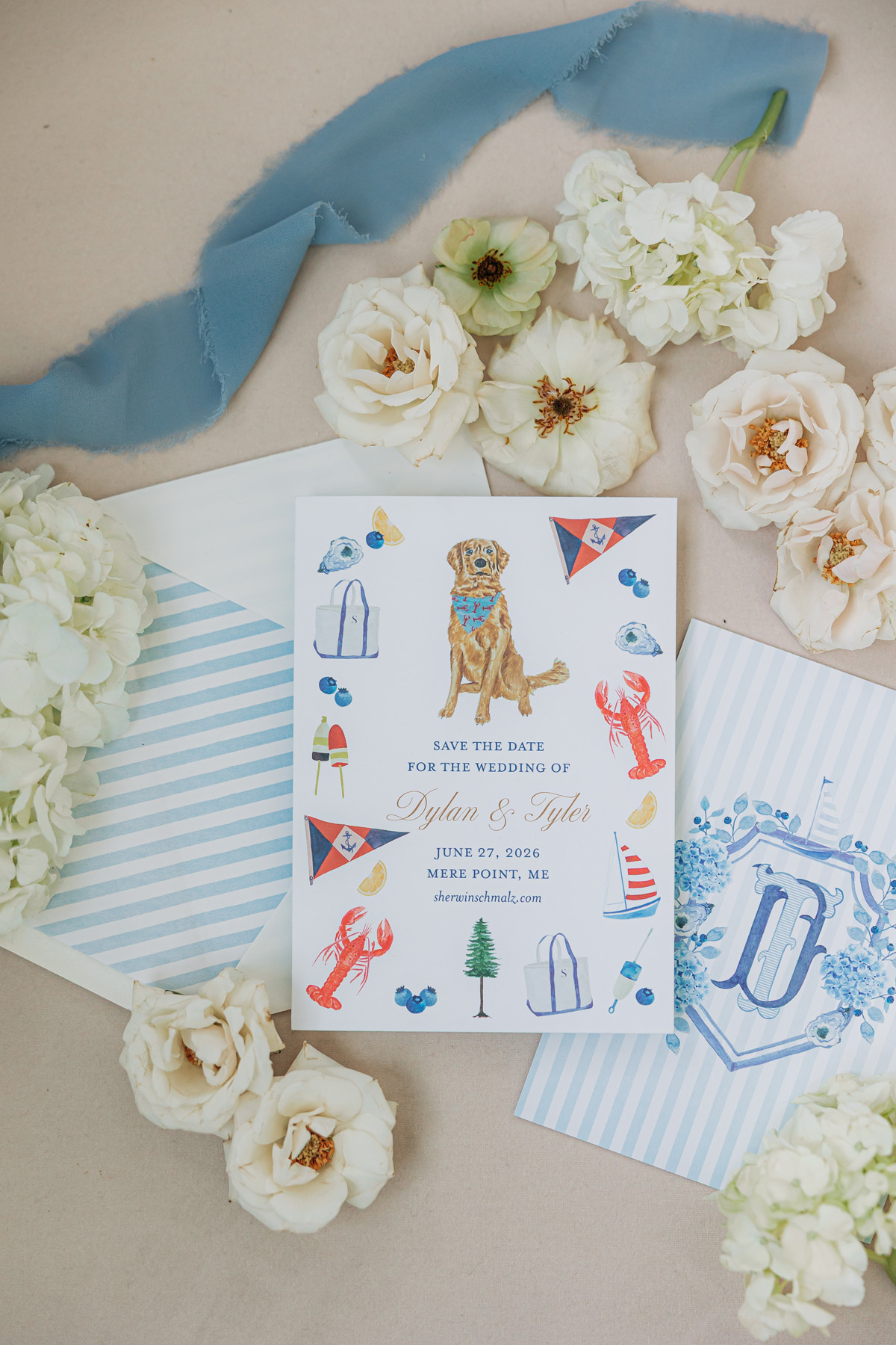 Custom illustrated watercolor wedding save the dates for a Maine seaside wedding with nautical details and a golden retriever dog watercolor illustration