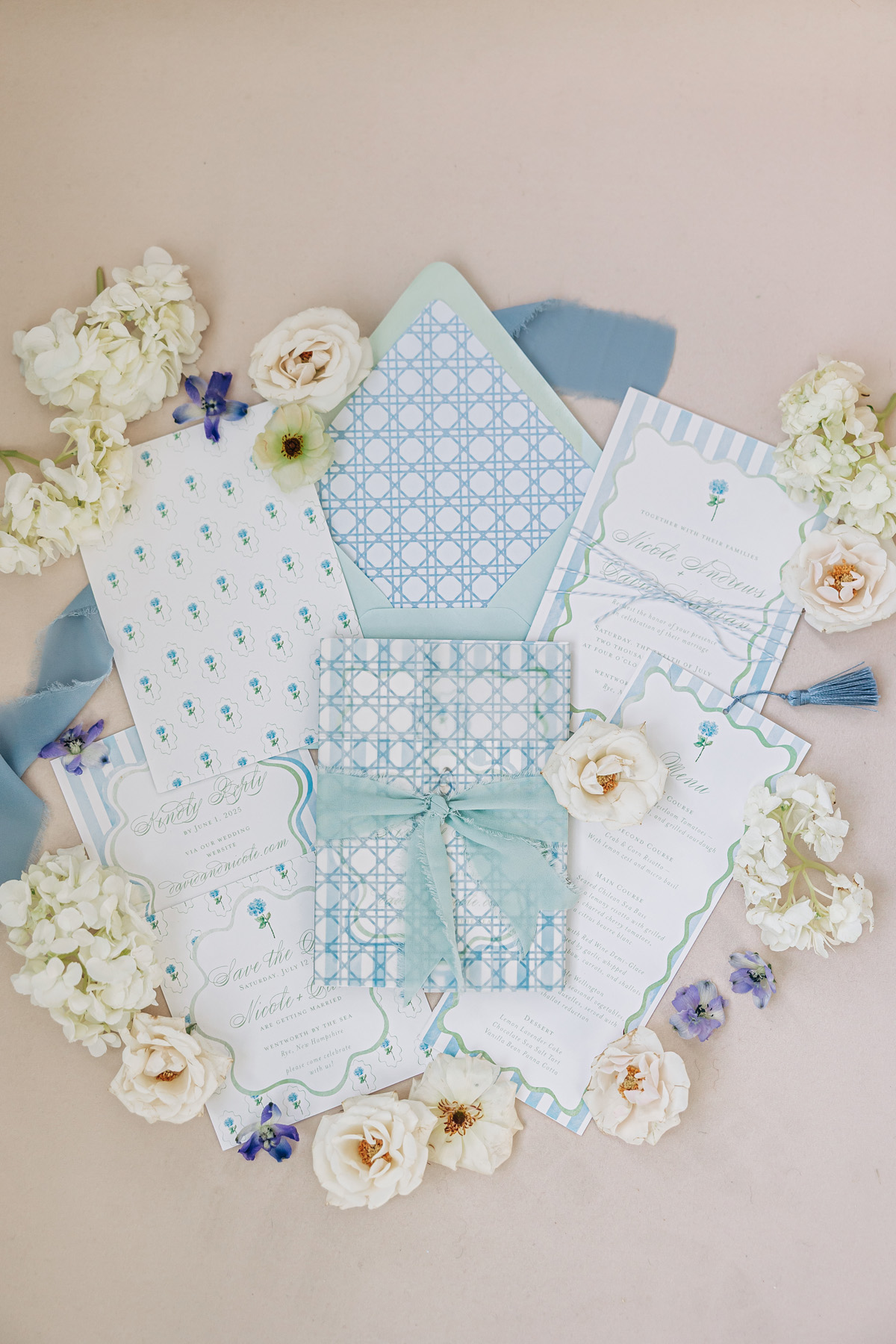 Blue and white hydrangea coastal wedding invitations with stationery details inspired by seaside texture and classic New England design for a coastal wedding venue