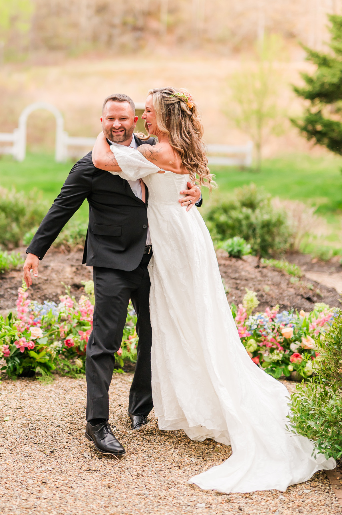 anaphora flowers wedding flowers a bride and groom with a ground meadow floral ceremony arch